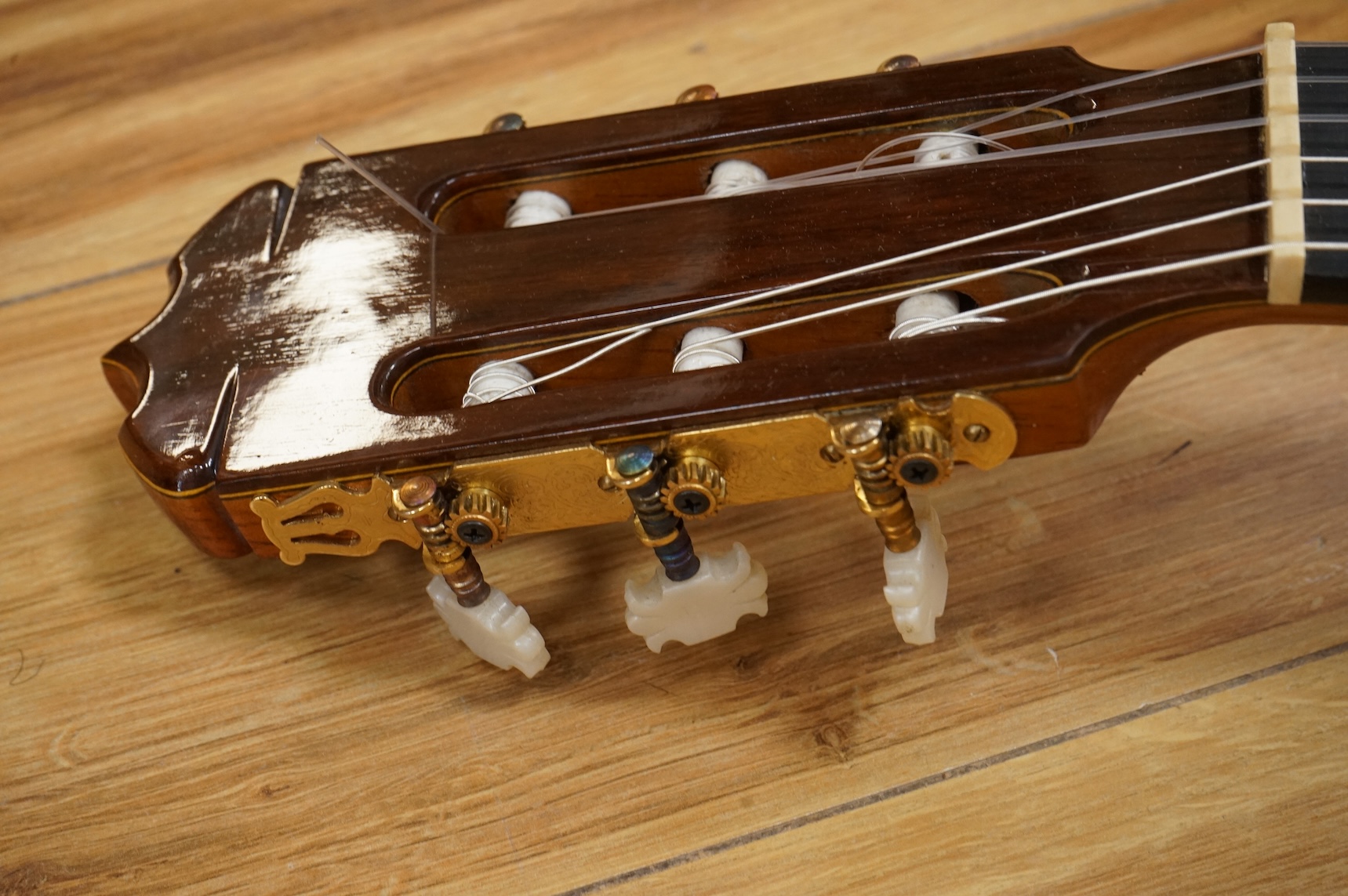 A Ricardo Quiles classical guitar, a Ramirez copy, with spruce top, Indian rosewood back and sides and ebony fingerboard.